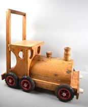 A Vintage Wooden Push Along Locomotive Toy