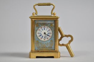 A Reproduction Miniature Sevres Style Carriage Clock with Floral Decorated Porcelain Panels, 7.