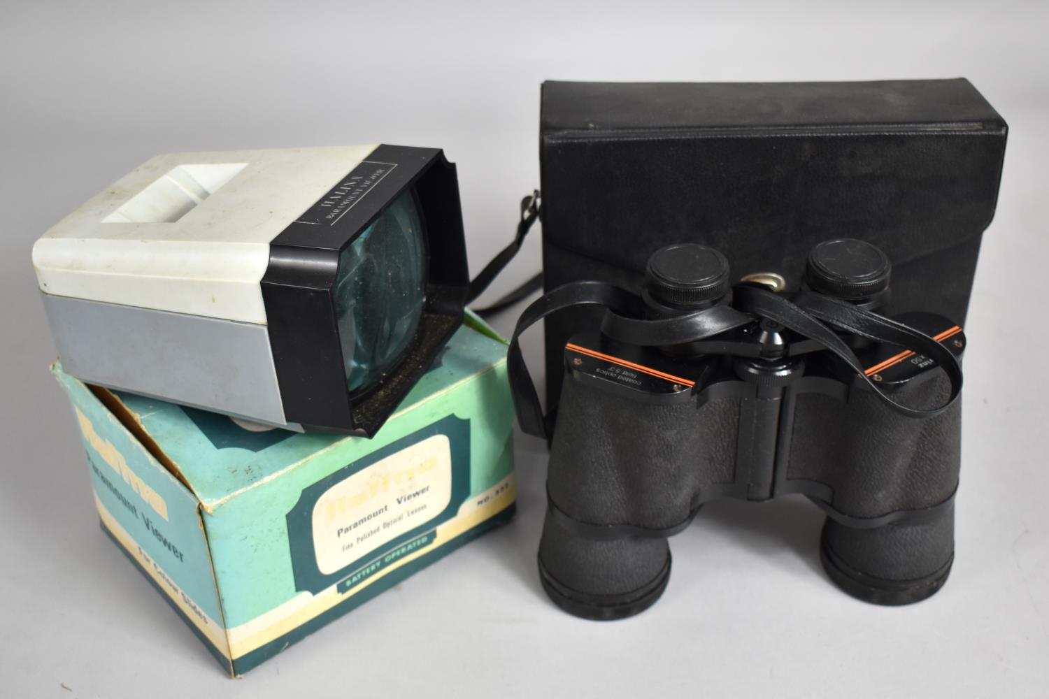 A Boxed Pair of Prinz 10x50 Binoculars together with a Halina Slide Projector