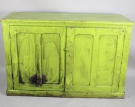 A Green Painted Pitch Pine Side Cabinet with Panelled Doors to Shelved Interior, 142cm Wide, Taken