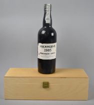 A Wooden Box Containing Single Bottle of Cockburn's 1985 Vintage Port