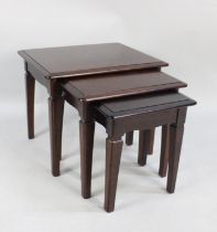 A Nest of Three Stag Mahogany Tables, 55cm wide