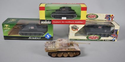 A Collection of Three Boxed Diecast Model Tanks and an Unboxed Corgi Tiger Tank
