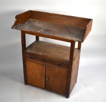 A Country Made Oak Wash Stand with galleried Back, Centre Drawer and Cupboard Base, 80cms Wide