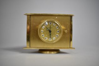 A French Brass Cased Weather Station of Triangular Form on Revolving Circular Foot with Clock,