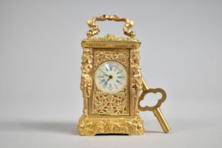 A Reproduction French Style Miniature gilt Cased Carriage Clock with Maiden Pilasters, Enamelled