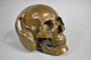 A Heavy Bronze Novelty in the Form of Skull Wearing Headphones