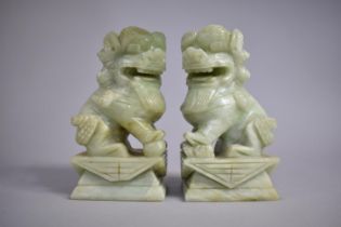 A Pair of Carved Green Stone Studies of Temple Lions on Plinth Base, 16cms High