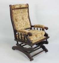 An Edwardian Upholstered American Rocking Chair