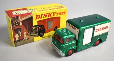 A Boxed Dinky Toys Bedford T.K. Box Van with Roll-Shuttered Doors on Near Side, No 450
