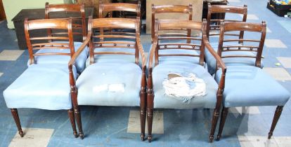 A Set of Eight Mahogany Framed Ladder Back Dining Chairs