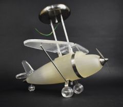 A Modern Glass and Perspex Ceiling Light Fitting in the Form of an Aeroplane, 37cms High