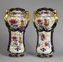 A Pair of Thomas Forester & Sons Vases in the Phoenix Ware Pattern and with Stylised Twin Mask