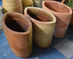 Three Terracotta Planters of Compressed Oval Form, 61x48.5cms High