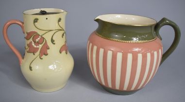 A James Macintyre Talus Faience Jug together with a Gesso Faience Jug with Metal Swivel Lid