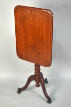 A 19th Century Mahogany Rectangular Mahogany Snap Top Tripod Table, 61cms Wide