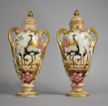 A Pair of Royal Bonn Vases and Covers of Baluster Form with Twin Handles Decorated with Ostrich,