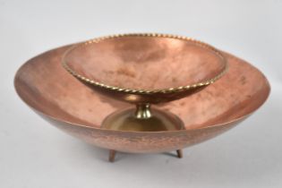 A Circular hand Beaten Four Legged Copper Bowl, 28cms Diameter together with a Hand Beaten Arts