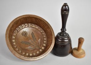 A 19th Century Turned Mahogany Butter Stamp, A Smaller Example with Floral Decoration and a Circular