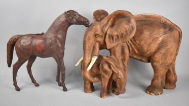 A Leather Covered Horse Ornament, Missing Ears together with a Composition Resin Study of Elephant