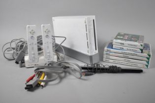 A Wii Gaming Console, Controllers and Games Etc