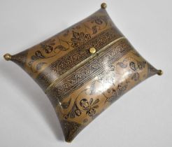 A Niello Decorated Brass Box in the Form of a Cushion, 14cms Wide