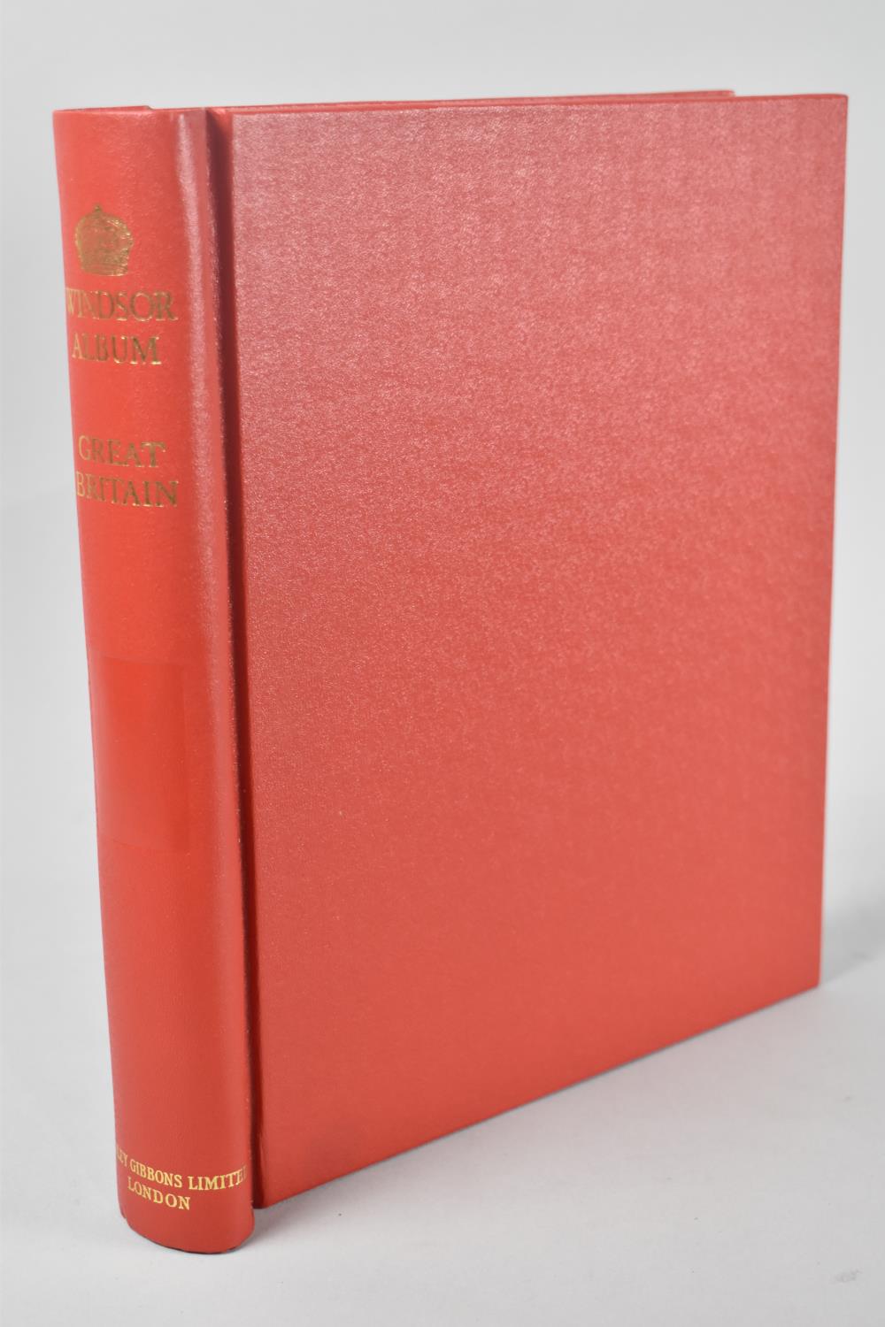 A Stanley Gibbons Windsor Stamp Album Containing an Almost Complete Run of QEII Commemorative Stamps