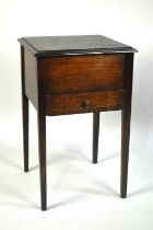 An Edwardian Oak Lift Top Satin Lined Sewing Box with Base Drawer, 37.5cms Wide