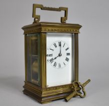 An Early 20th Century Brass Cased Carriage Clock with White Enamelled Dial with Key but Movement