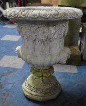 A Reconstituted Stone Garden Planter of Urn Form, Moulded Bacchus Bust with Vine and Grape Design,