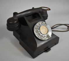 A Vintage Black Bakelite Telephone with Pull Out Number Drawer