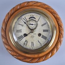 An American Circular Wall Clock by The Ansonia Clock Company, New York, Having Carved Rope Border, 8