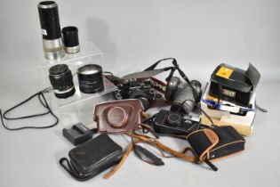 A Collection of Various Cameras to Comprise Praktica, Canon etc Together with Various Lenses to