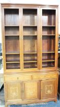 A Large Continental Inlaid Bookcase with Six Inner Shelves to Unglazed Top Section, Base Section