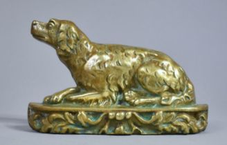 A Cast Brass Small Doorstop or Fireside Ornament Depicting Reclining Dog, 15cm Wide