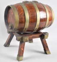 An Edwardian Oak Double Ended Coopered Spirit Barrel on Stand, 24cms Long