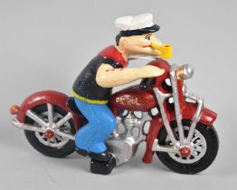 A Reproduction Cold Painted Cast Iron Figure of Popeye riding Motorcycle, 22cm Long, +VAT