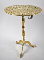 A Late 19th Century Pierced Brass Circular Topped Tripod Trivet with Viking Longship Decoration,