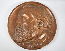 A Cast Circular Metal Plaque a Portrait Relief of Leon Gambetta, a French Lawyer and Republican