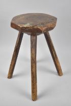 A Primitive Stool on Four Stake Supports, 39cm high