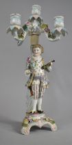 A Sitzendorf Porcelain Four Branch Candelabra, the Support in the Form of a Tree with Dandy,
