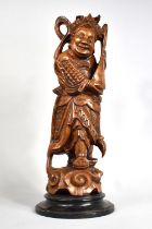 A Large Chinese Carved Wooden Figure Modelled as a Scholar Playing Lute, 49cm Overall