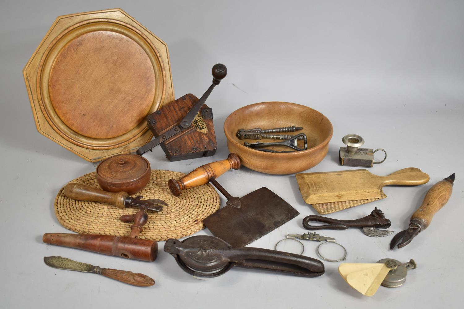 A Collection of Vintage Kitchenalia to Include Breadboard, Butter Packs, Can Openers, Nutcrackers,