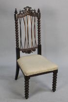 A Victorian Rosewood Framed Nursing Chair with Bobbin Front Legs and Back Supports