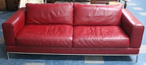 A Vintage Leather Upholstered Three Seater Settee, 200cm wide