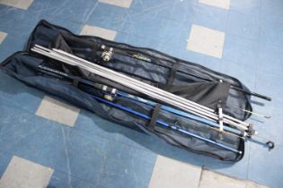 A Collection of Various Sea Fishing Rods with Stands and Canvas Carrying Bag