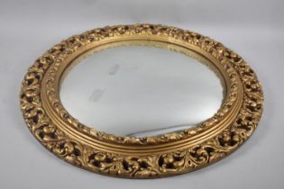 An Ornate Gilt Framed Convex Wall Mirror, 57cm Diameter