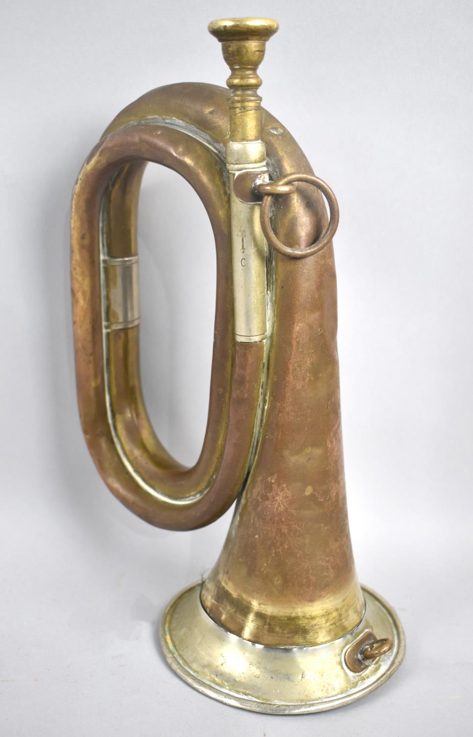 A World War One Period German Bugle, the Mouthpiece Holder Stamped with Arrow and C, Missing One