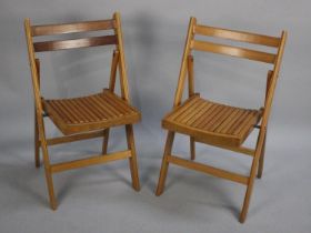 A Pair of Folding Wooden Chairs