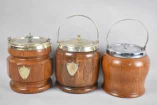 A Collection of Three Mid 20th Century Oak and Silver Plate Biscuit Barrels, 17cm High